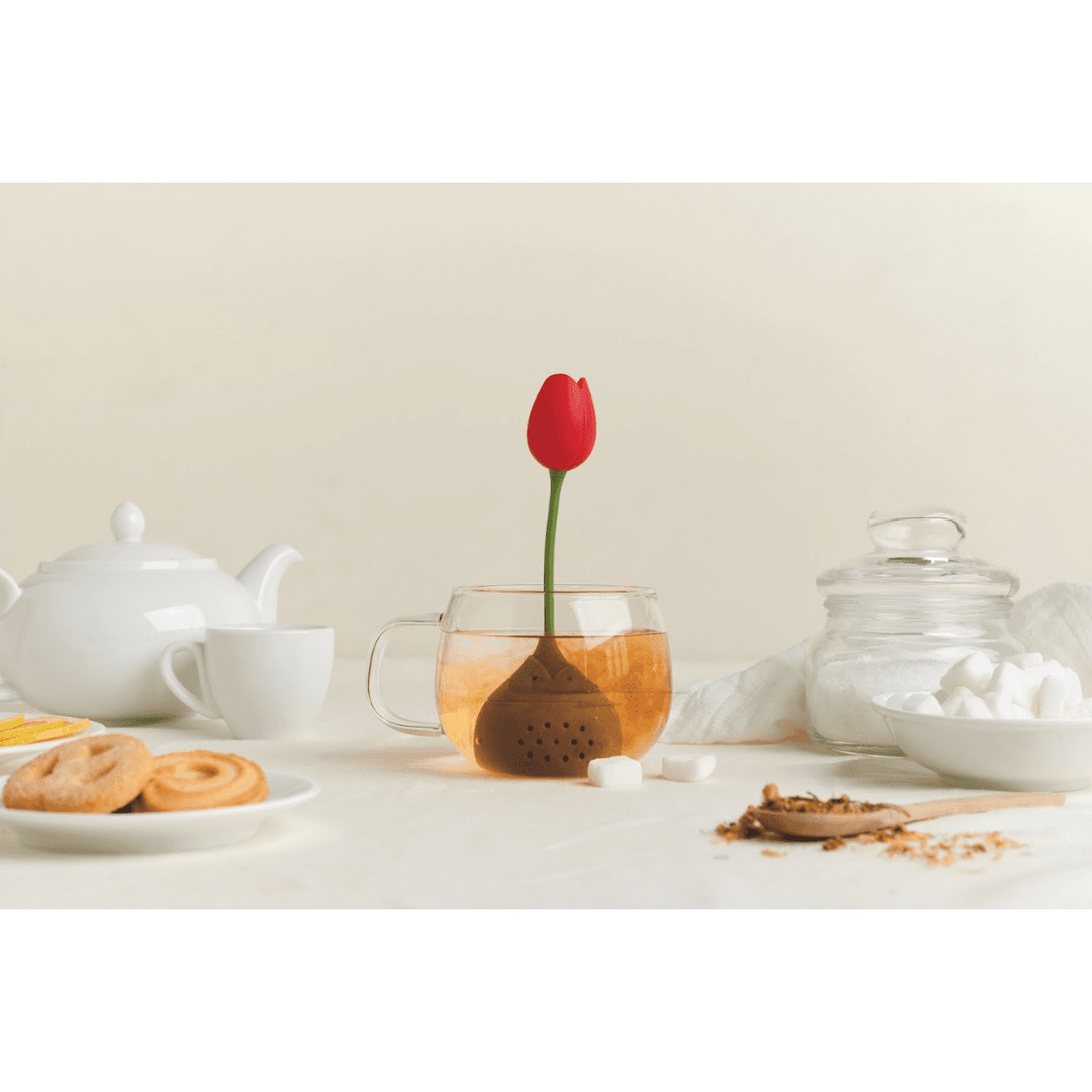 a teacup with a flower in it