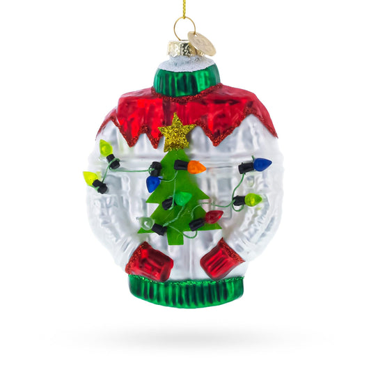 a christmas ornament with a sweater and lights