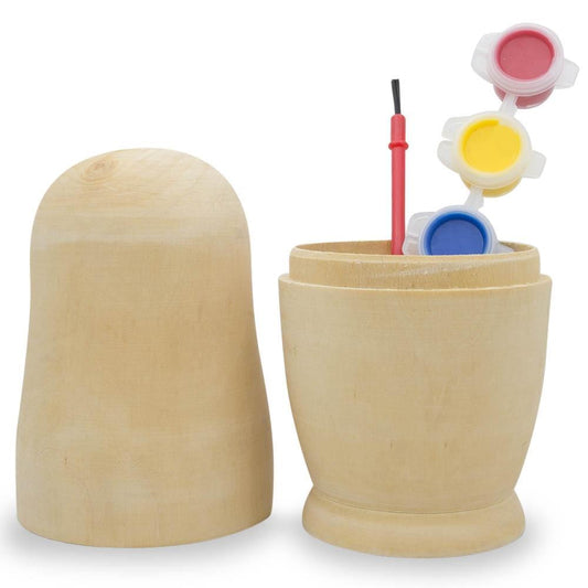 a wooden cup with paint colors inside