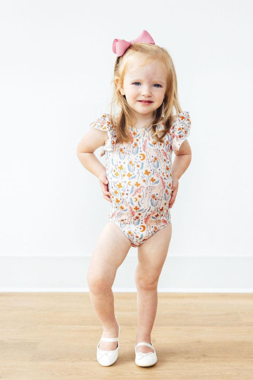 a girl in a bathing suit