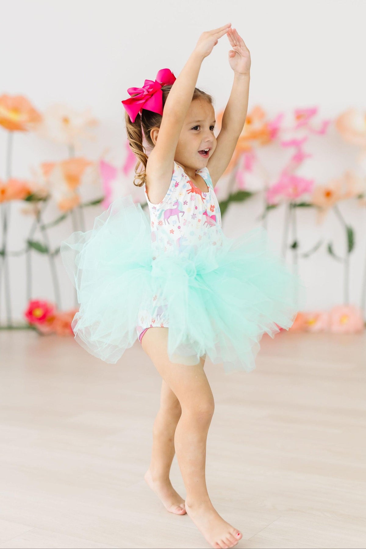 a girl in a tutu dancing