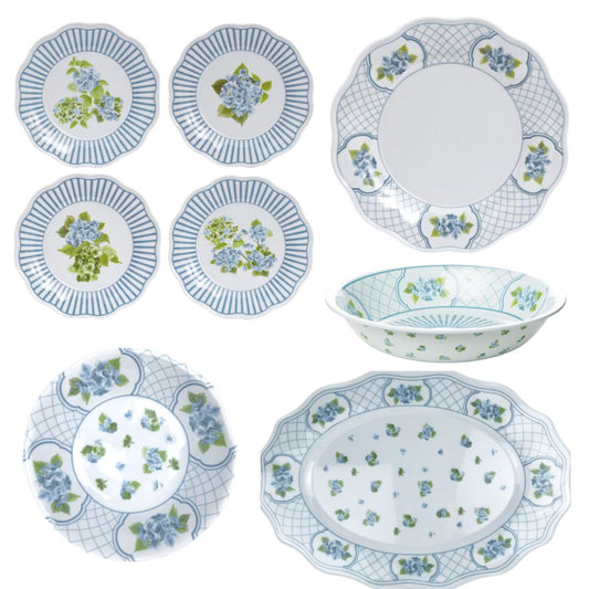 a collection of plates and bowls
