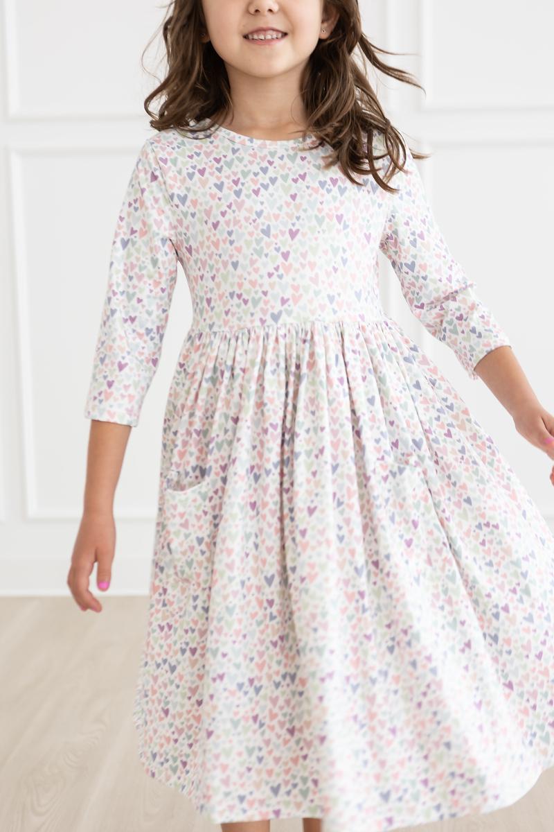 a girl in a dress