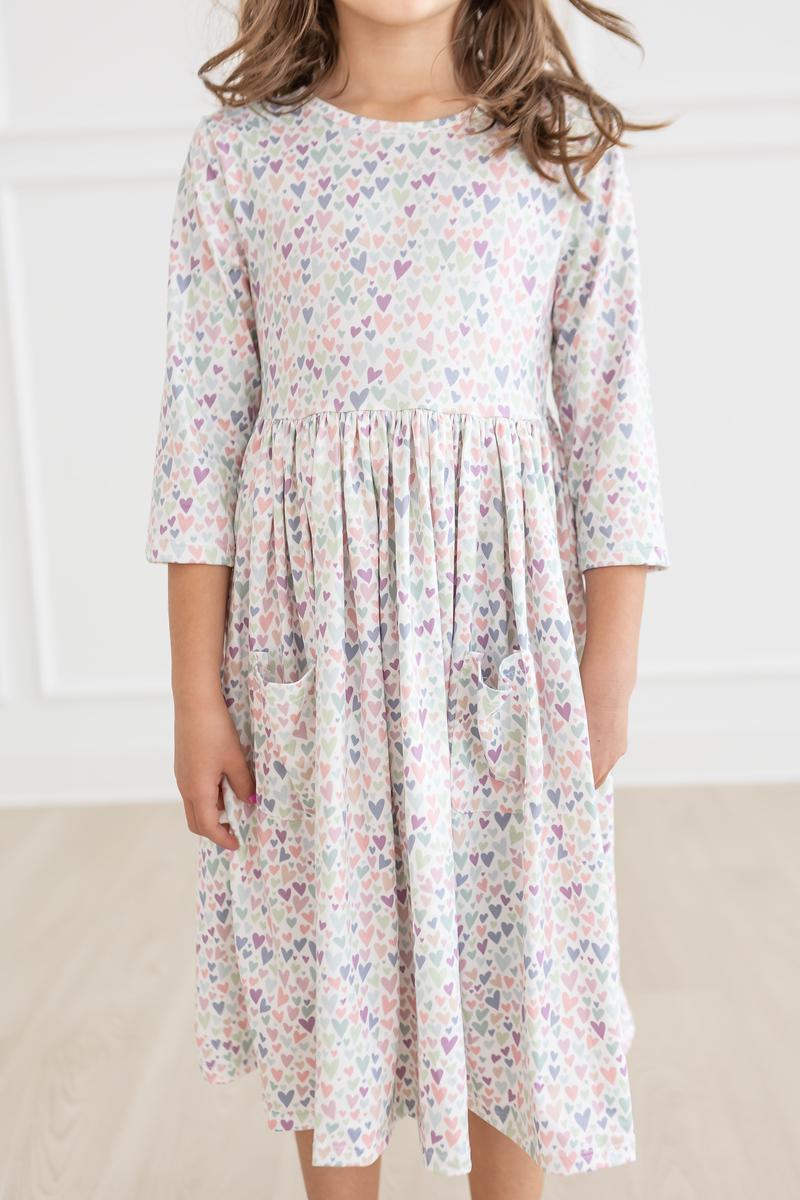 a girl wearing a dress