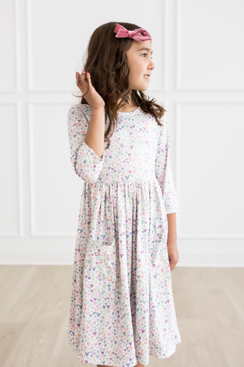 a girl in a dress