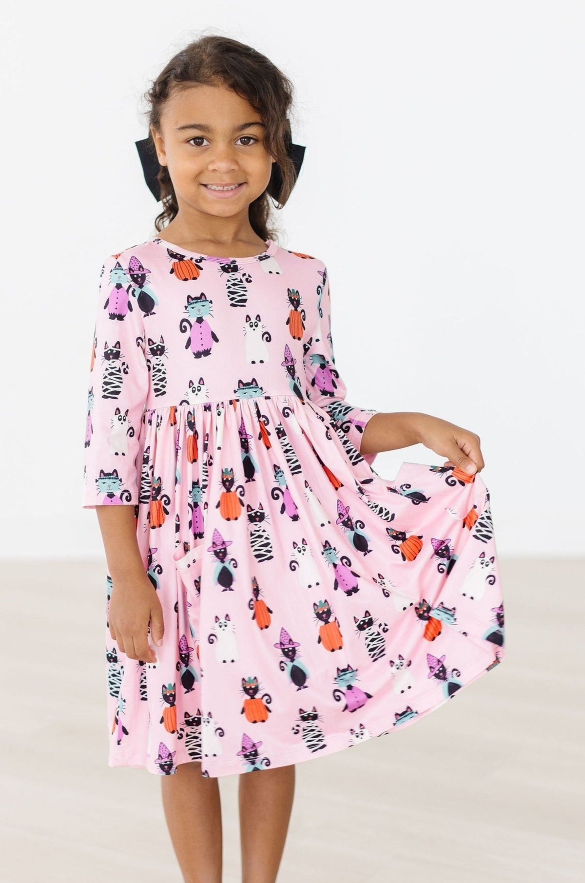 a girl in a dress