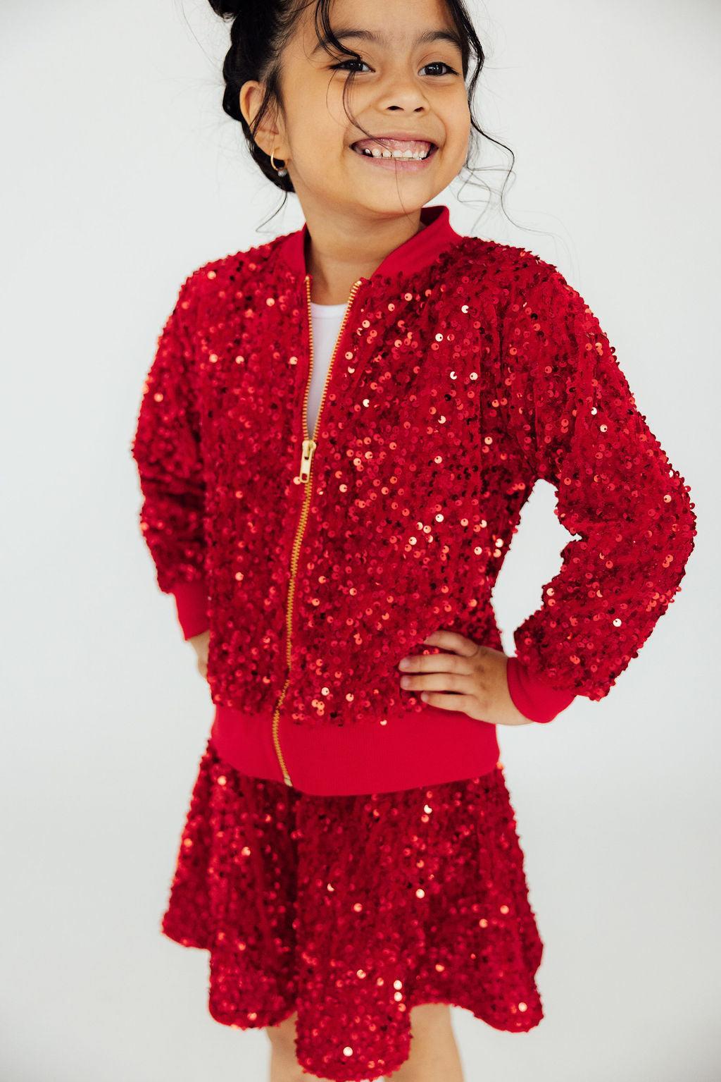 a girl in a red outfit
