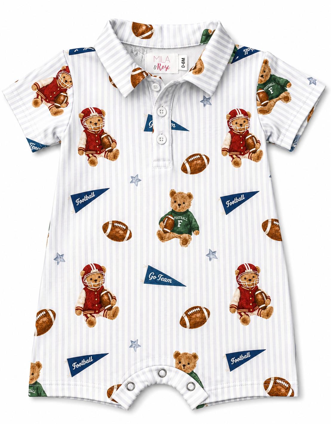 a baby's shirt with teddy bears and footballs