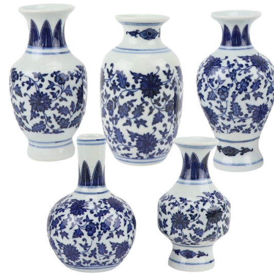 a group of vases with blue and white designs