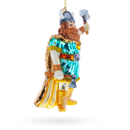 a christmas ornament of a viking holding an ax