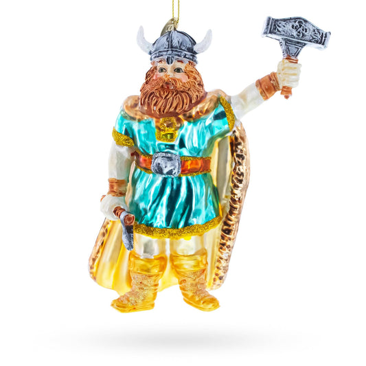 a christmas ornament of a viking holding a hammer