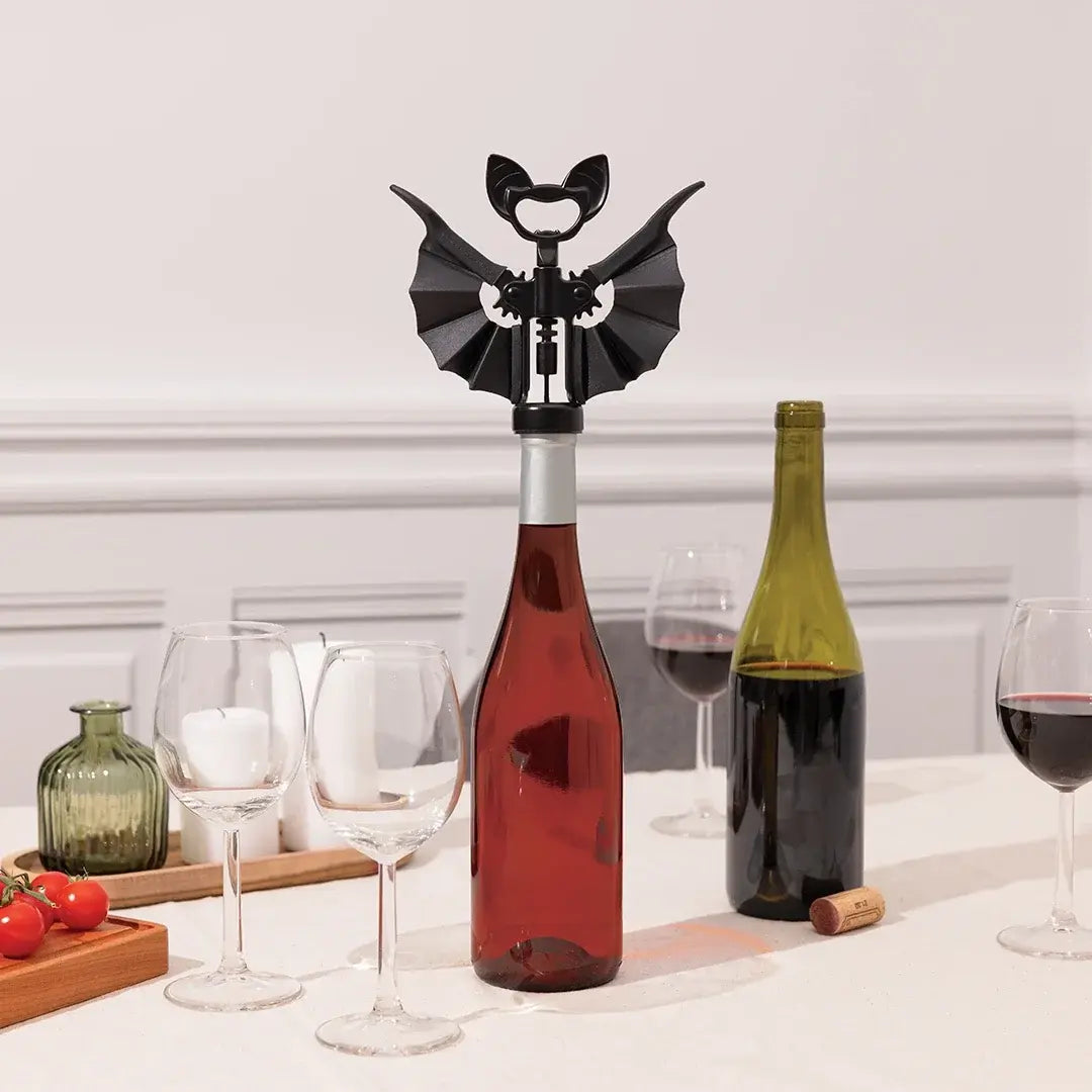 a wine bottle with a corkscrew on top of it