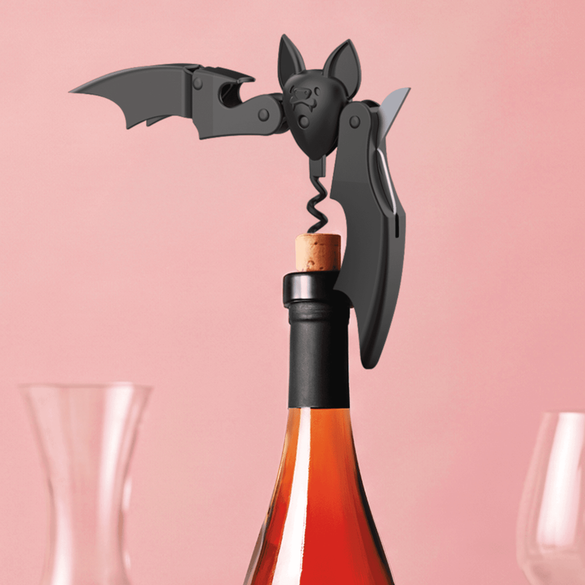 a bottle of wine with a corkscrew