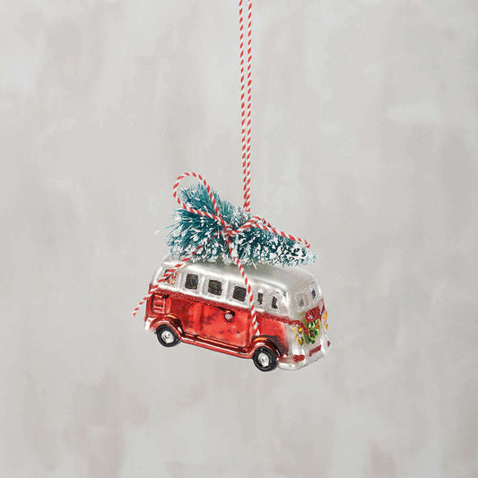 a christmas tree on a red and white string