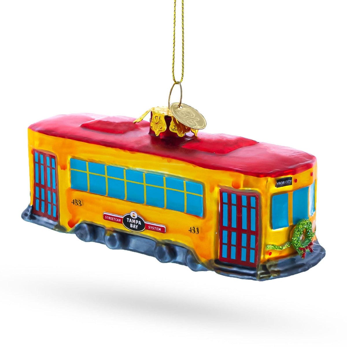 a christmas tree ornament with a train