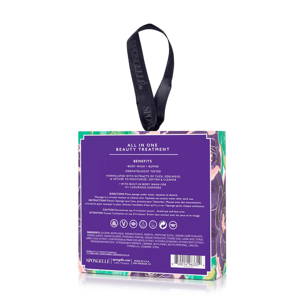a purple and green box with black ribbon