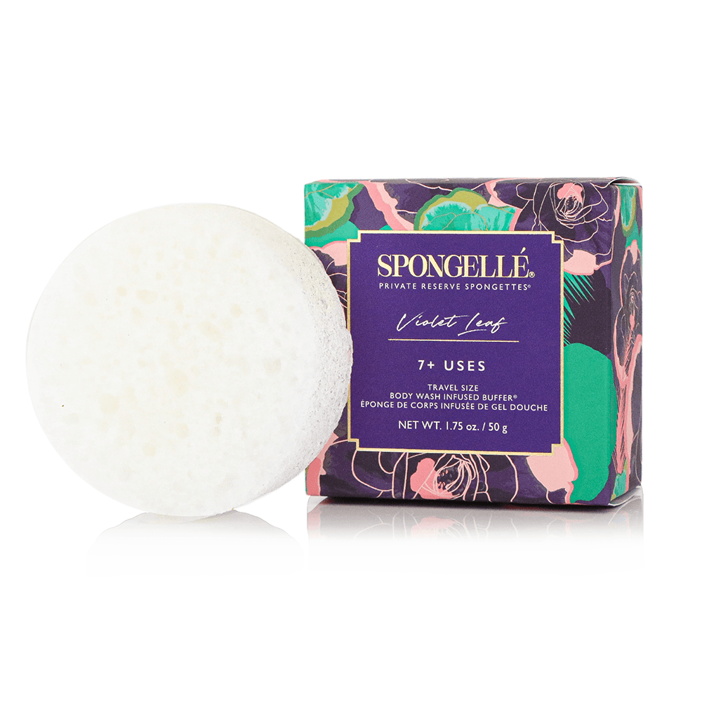 a white sponge next to a box
