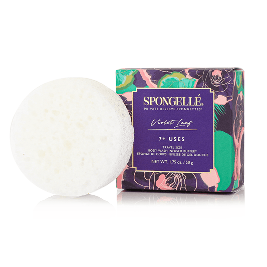 a white sponge next to a box
