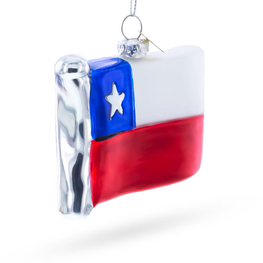 a christmas ornament with a flag