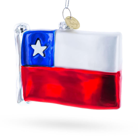 a glass ornament with a flag