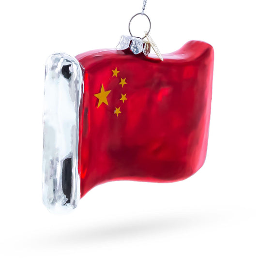 a red and silver flag ornament