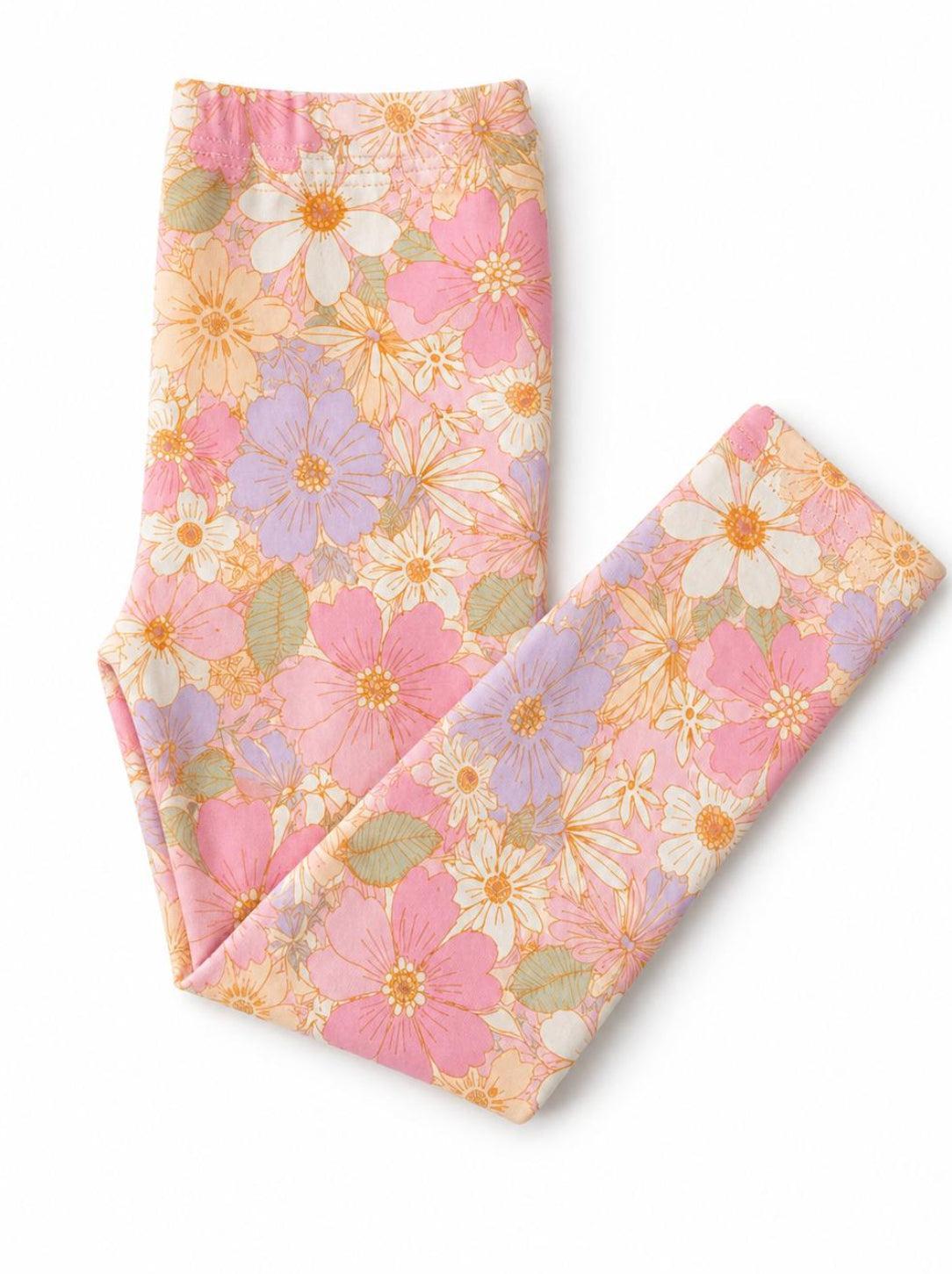 a pink and yellow floral patterned leggings