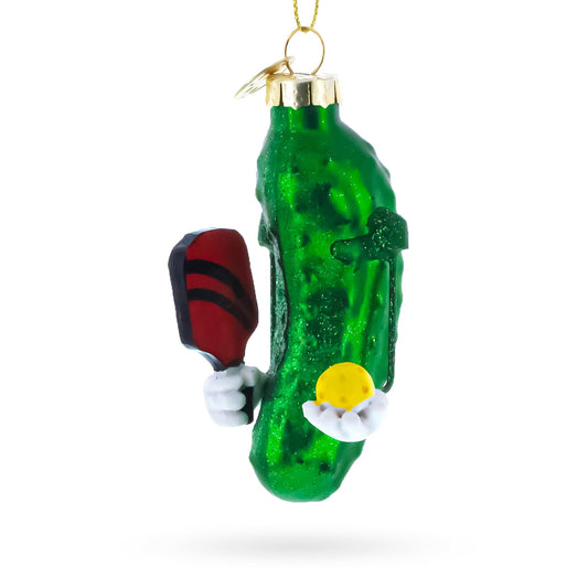 a green pickle ornament with a tennis racket and a yellow ball