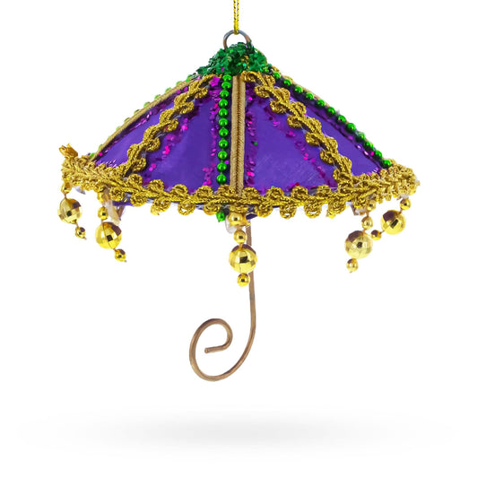 a purple and gold umbrella ornament