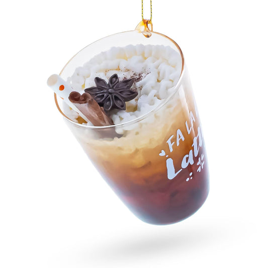 a glass with a drink and a straw