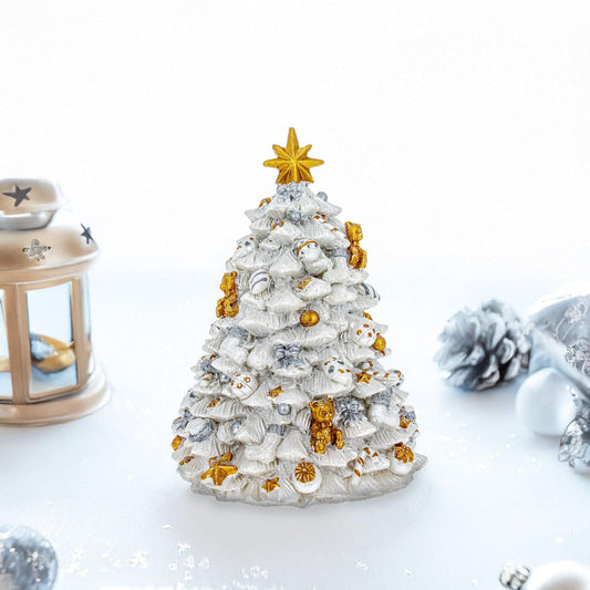 a white and gold christmas tree