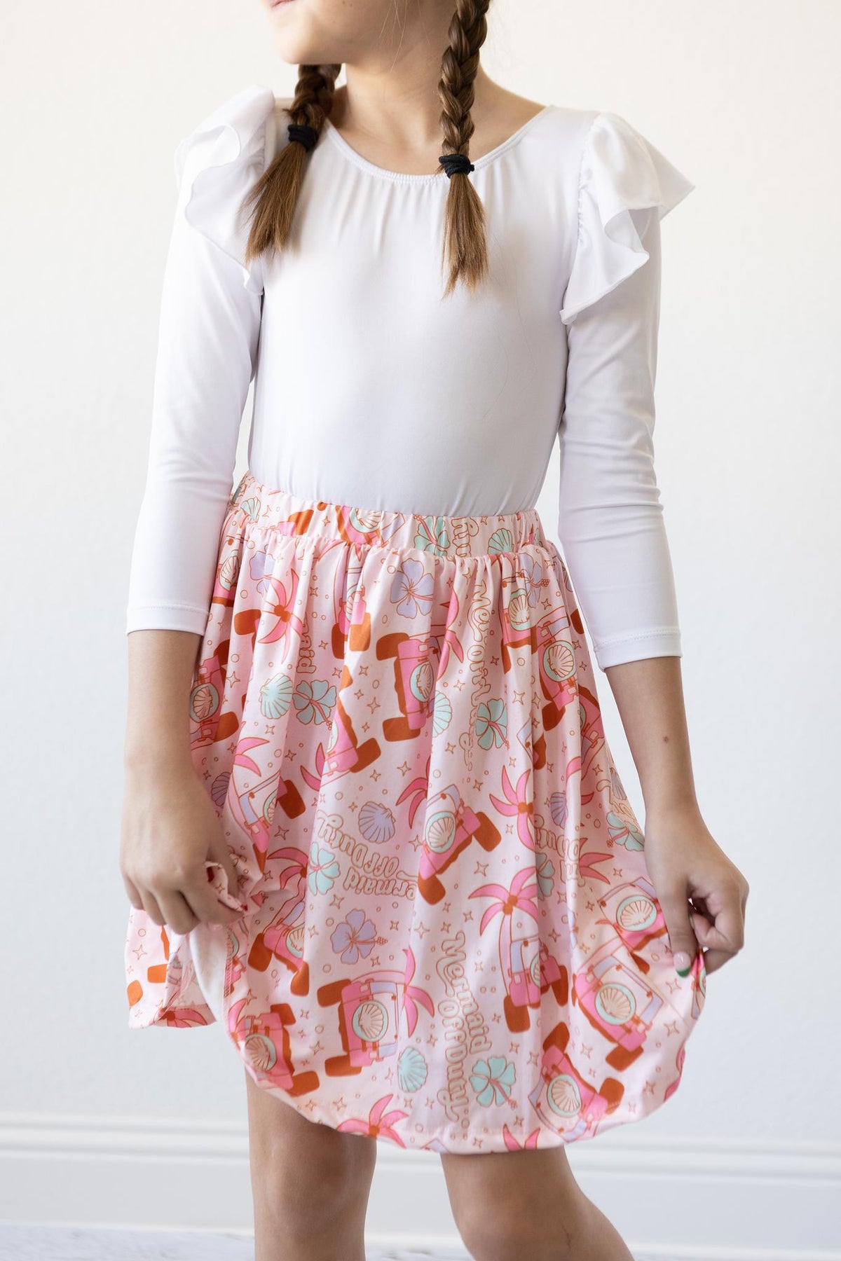 a girl wearing a skirt