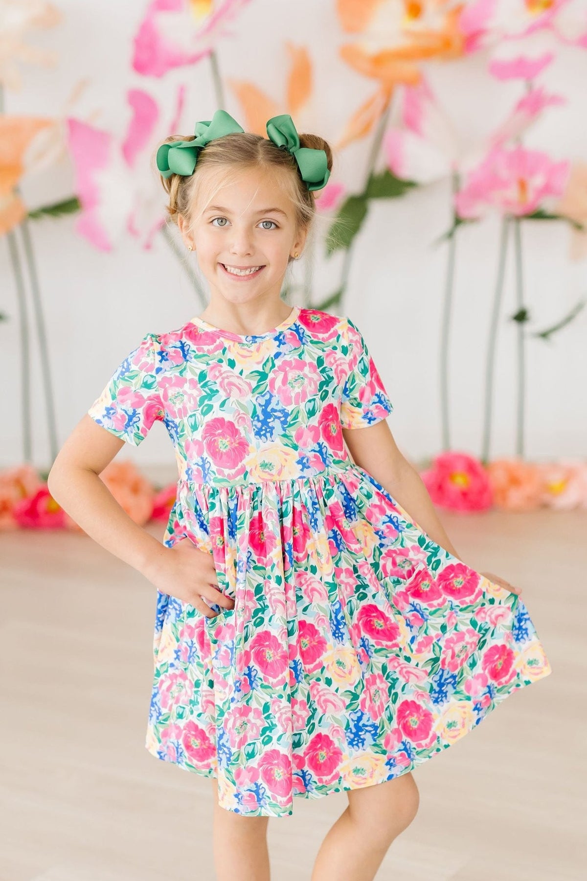 a girl in a floral dress