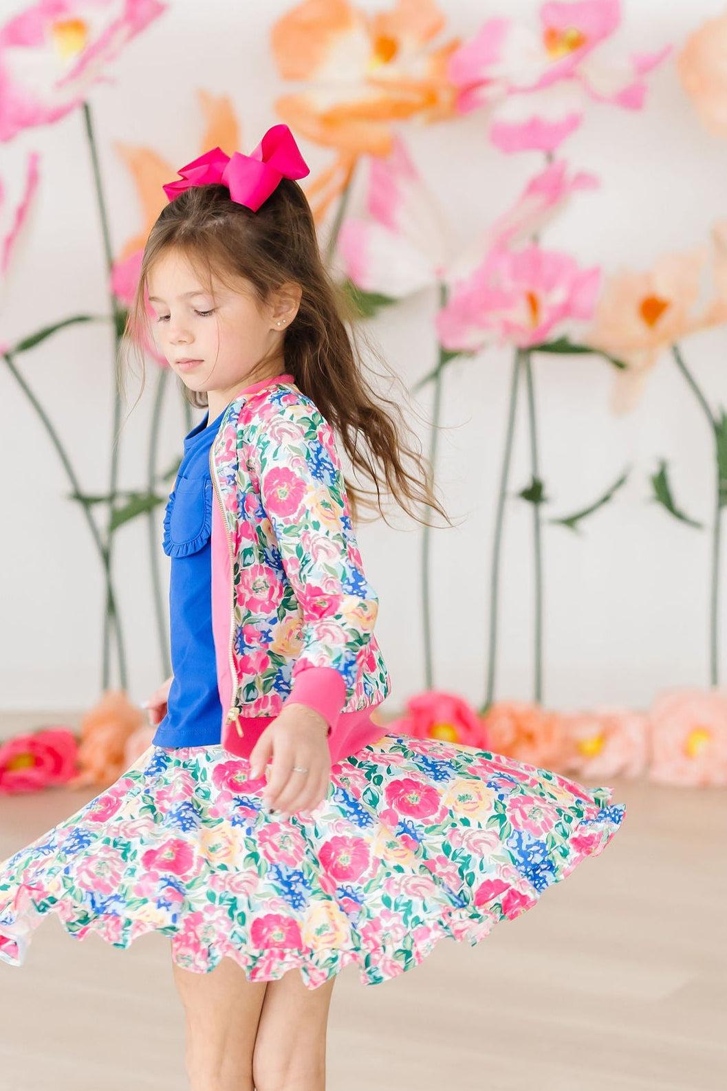 a girl in a flowered dress