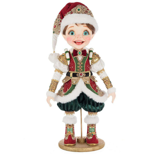 a toy figurine of a boy in a garment