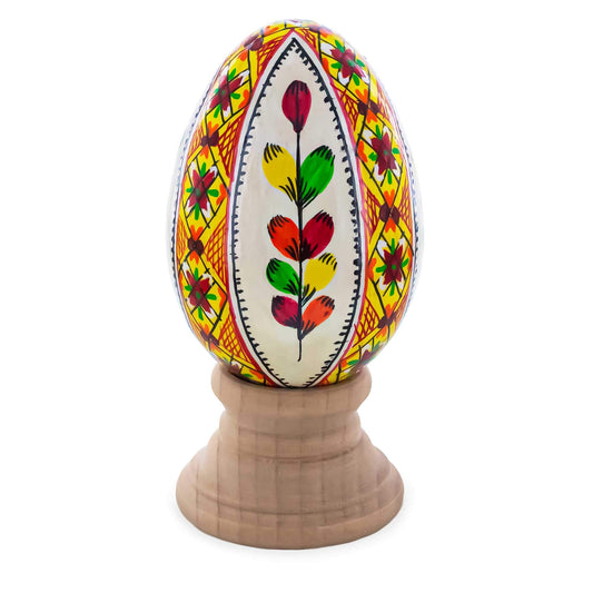 a colorful egg on a stand
