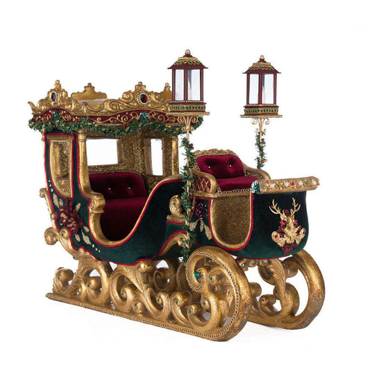 a gold and green sleigh with lights