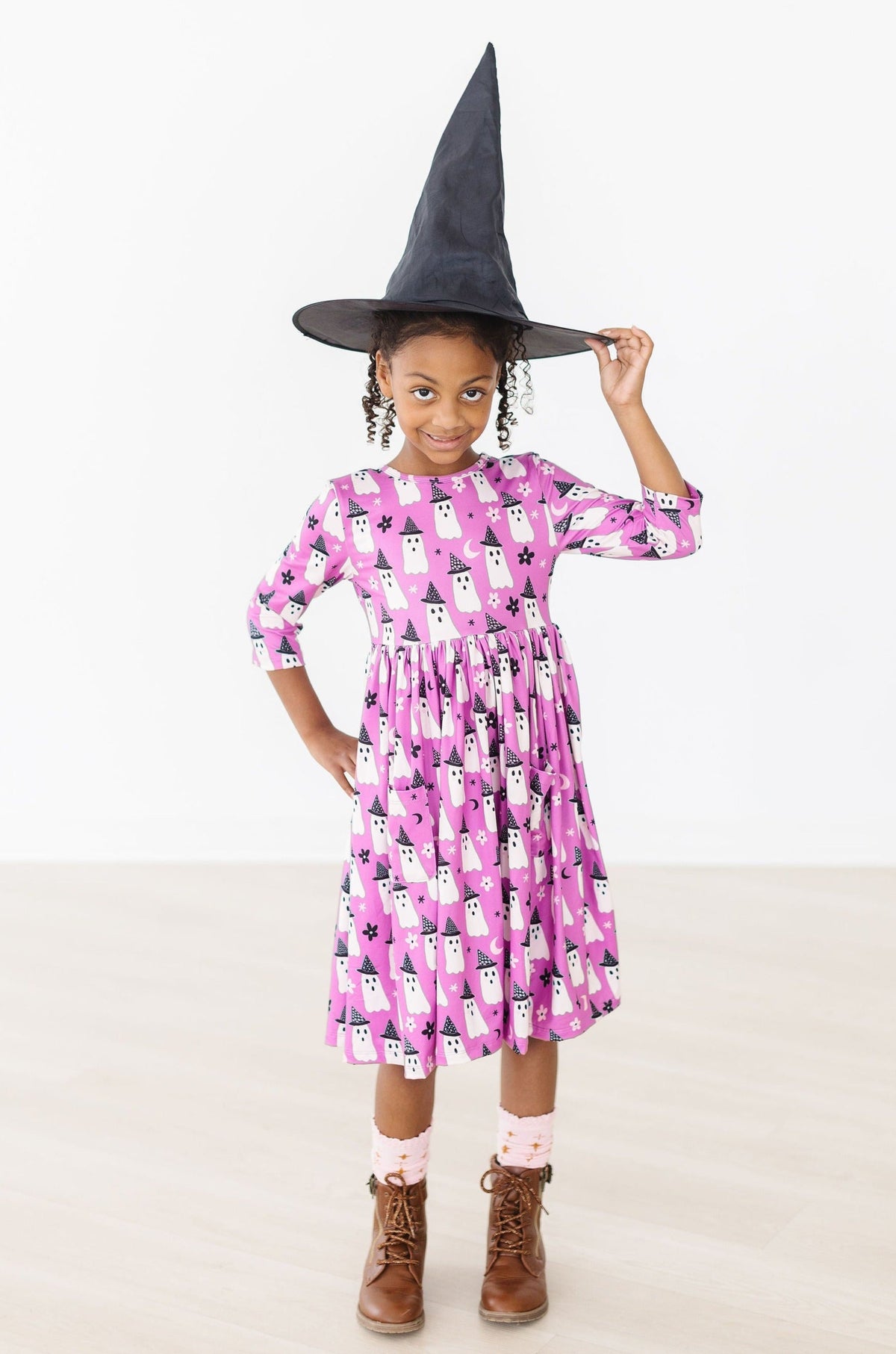 a girl wearing a person hat