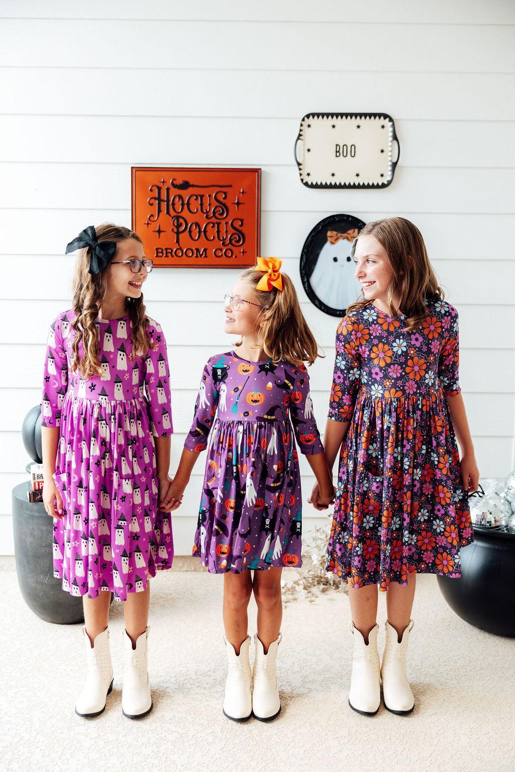 a group of girls holding hands