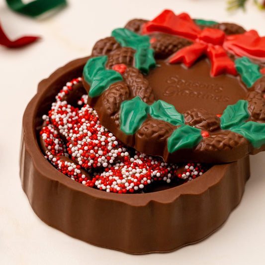 a chocolate box with candy inside