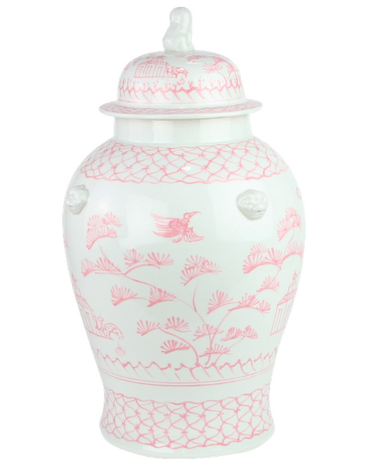 a white and pink vase with a lid