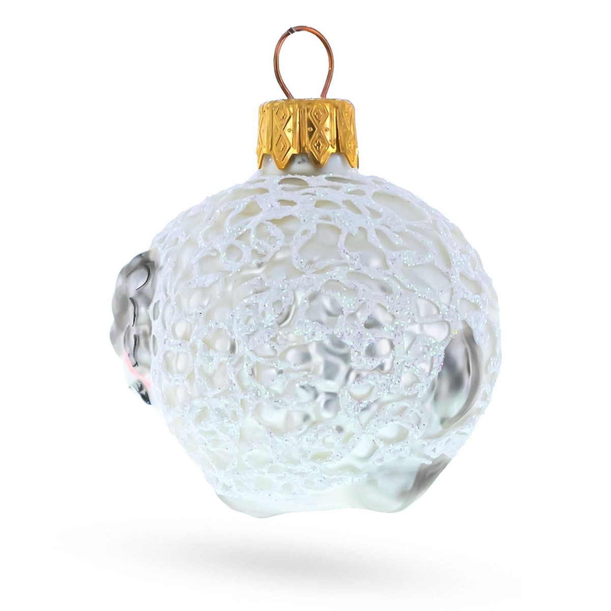 a white and gold christmas ornament