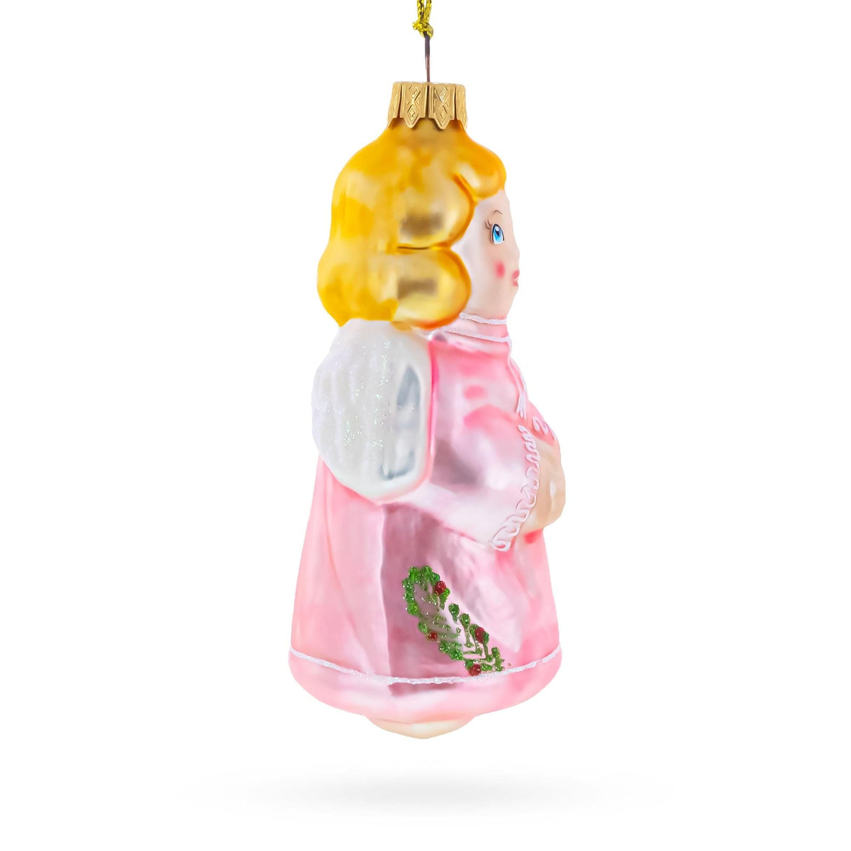 a christmas ornament with a pink dress