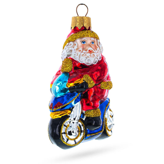 a santa on a motorcycle ornament