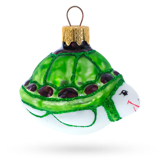 a green and white turtle ornament