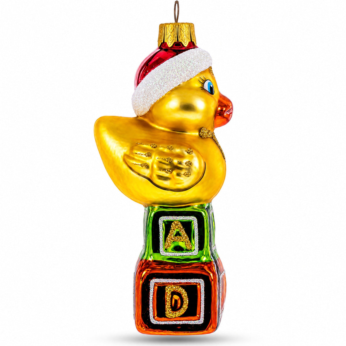 a gold duck with a red hat and letters on a colorful ornament