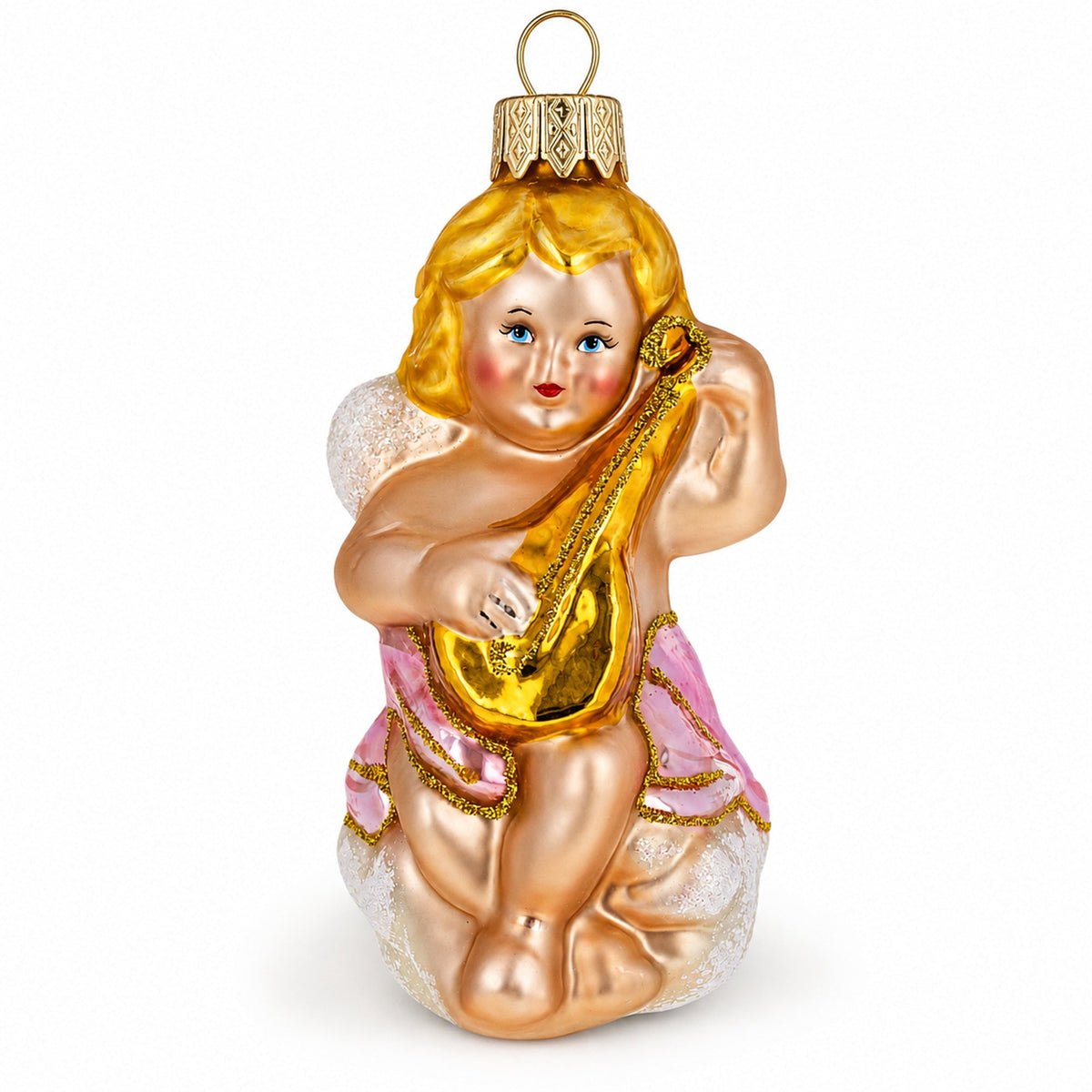 a gold angel ornament with a gold instrument
