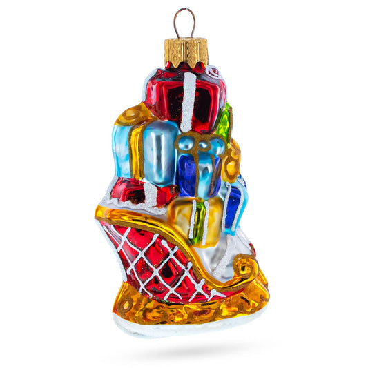 a christmas ornament with presents on it