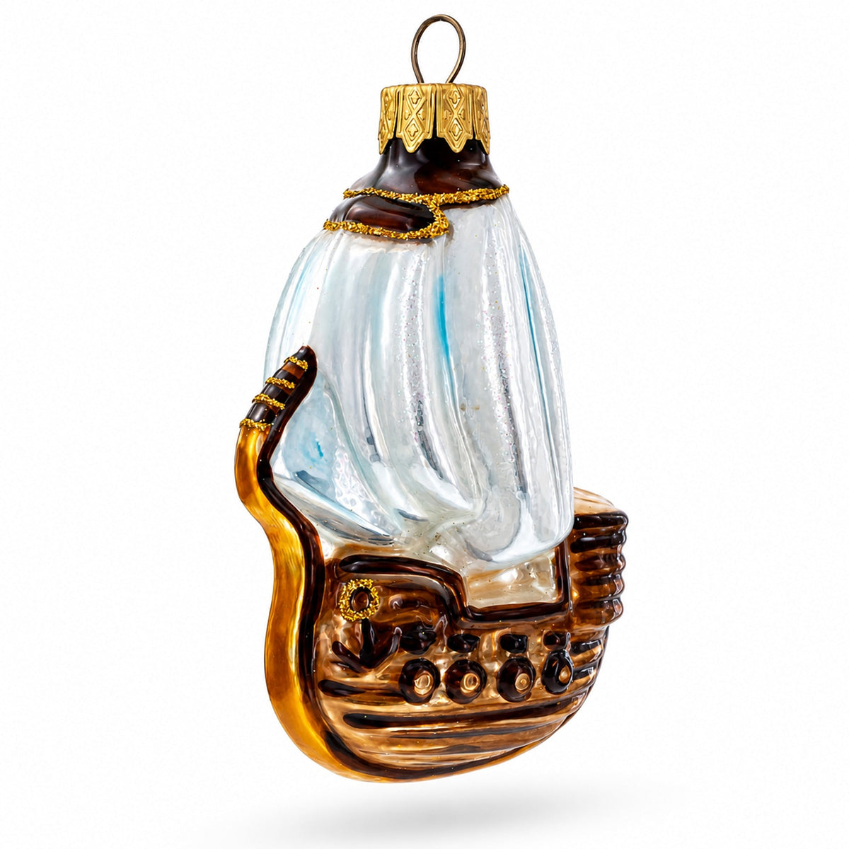 a glass ornament with a ship on it