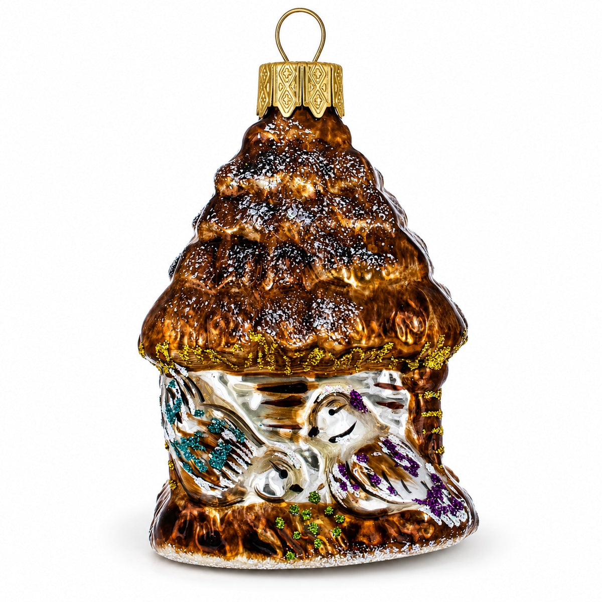 a christmas ornament with a bird house