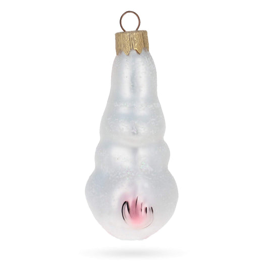 a white and gold christmas ornament